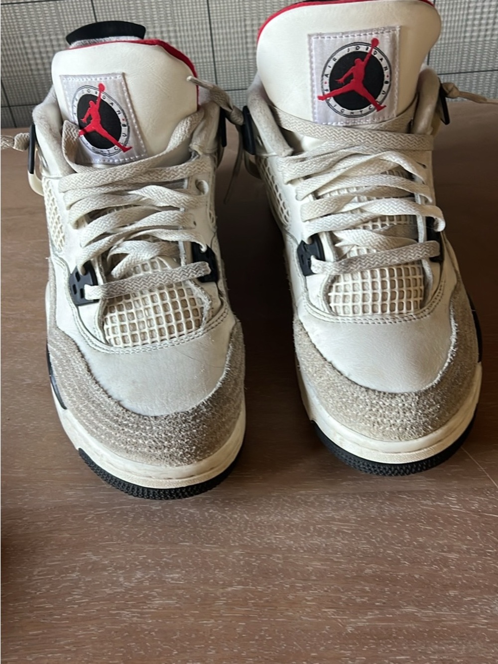 Jordan Men's Off-White and Beige Sneakers with Red Jumpman Accent